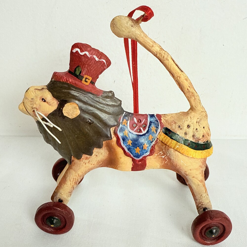 Red Tin Painted Lion Ornament With Wheel Figurine China